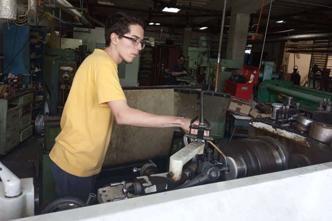 picture of me mechanizing a part in a lathe